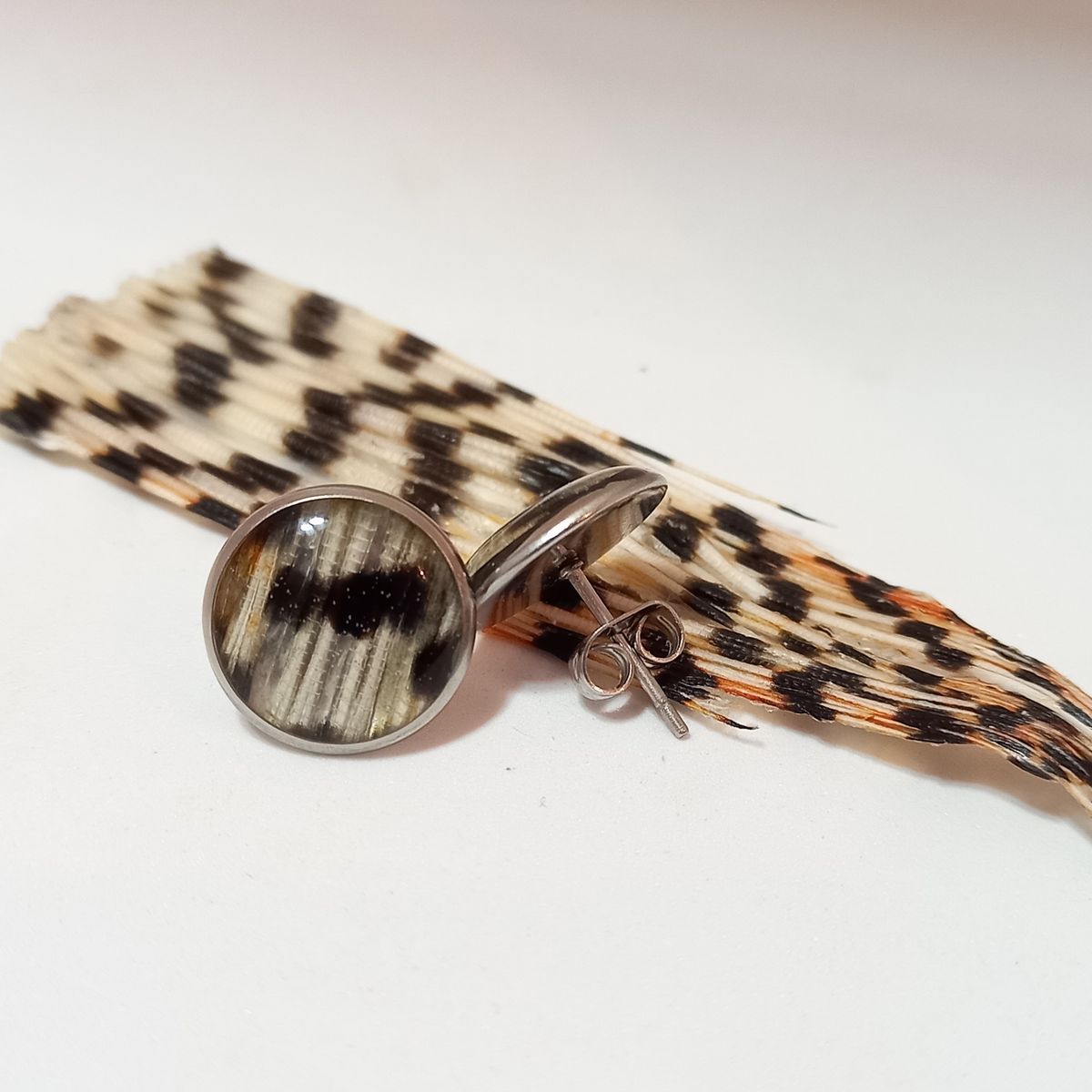 Lionfish studs made of the tail of Lionfish.jpg